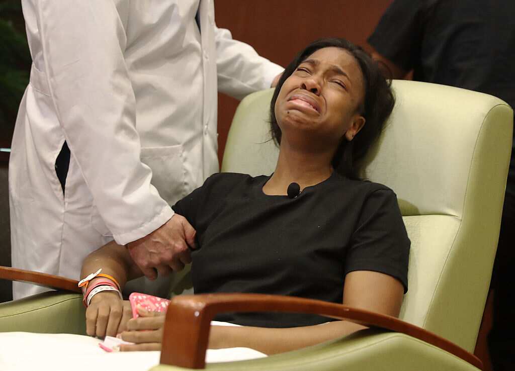 Patience Carter is overcome with emotion after speaking to the media from the Florida Hospital about being shot in the Pulse gay nightclub terror attack 