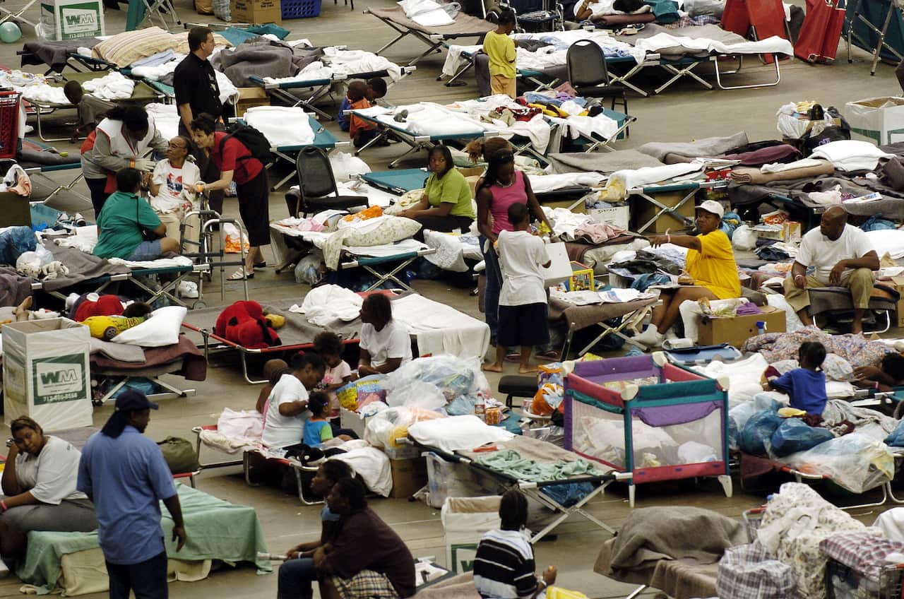 Hurricane Katrina evacuees, are shown 06