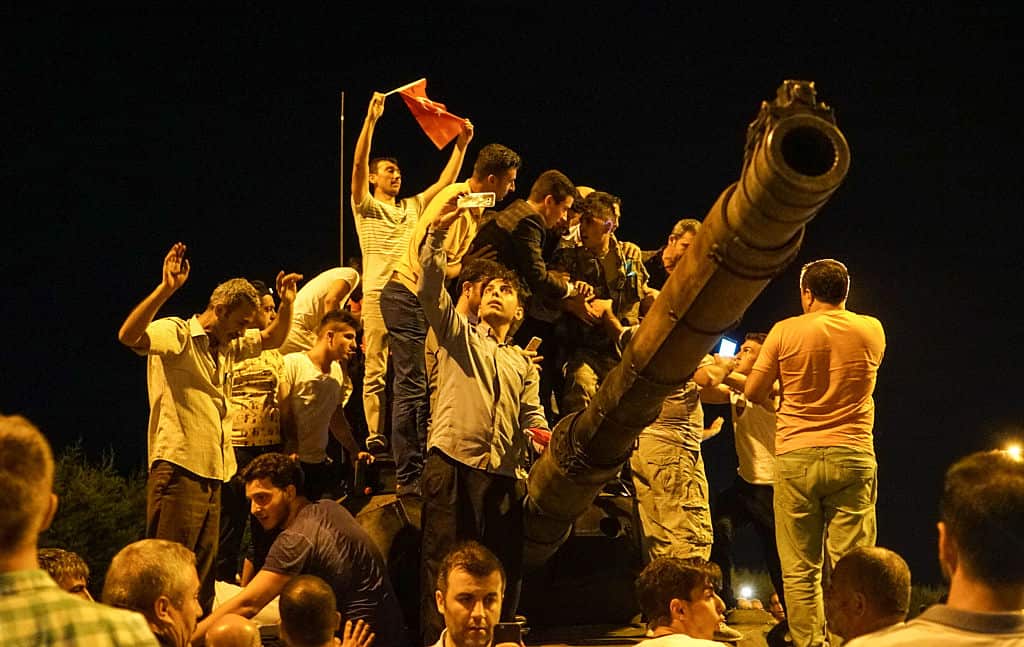 Protesters swarm a tank in Istanbul. 