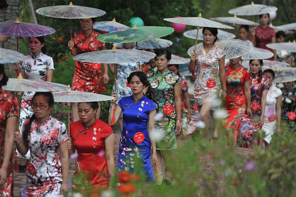 Women wearing cheongsams in China.