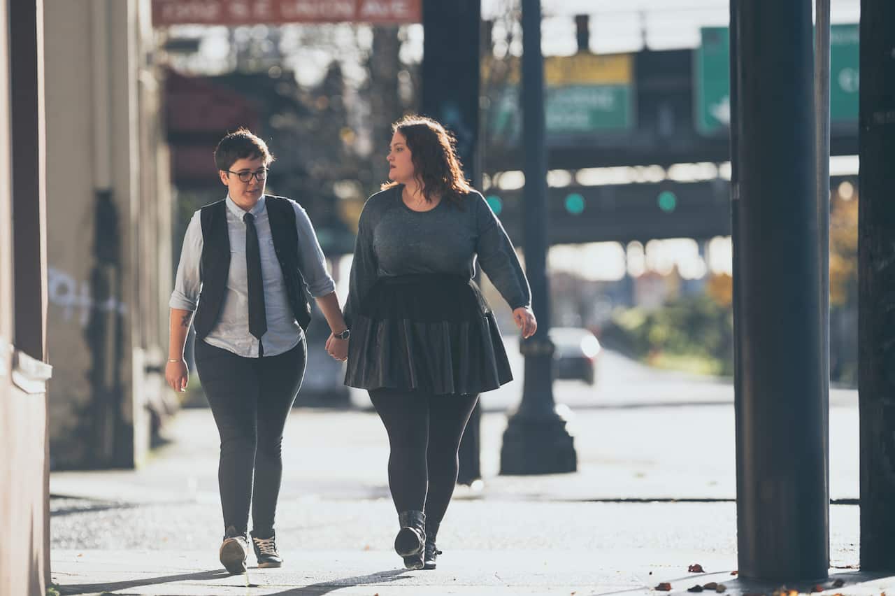 Homosexual couple spending time together and laughing.