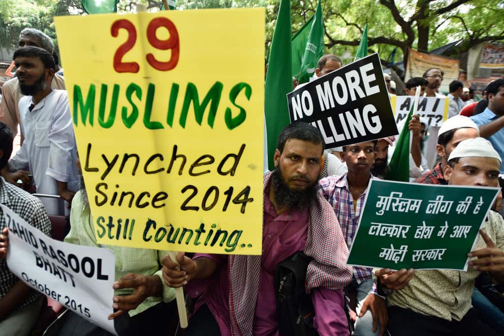 Protesters in Delhi condemn violence against Muslims and other minorities.