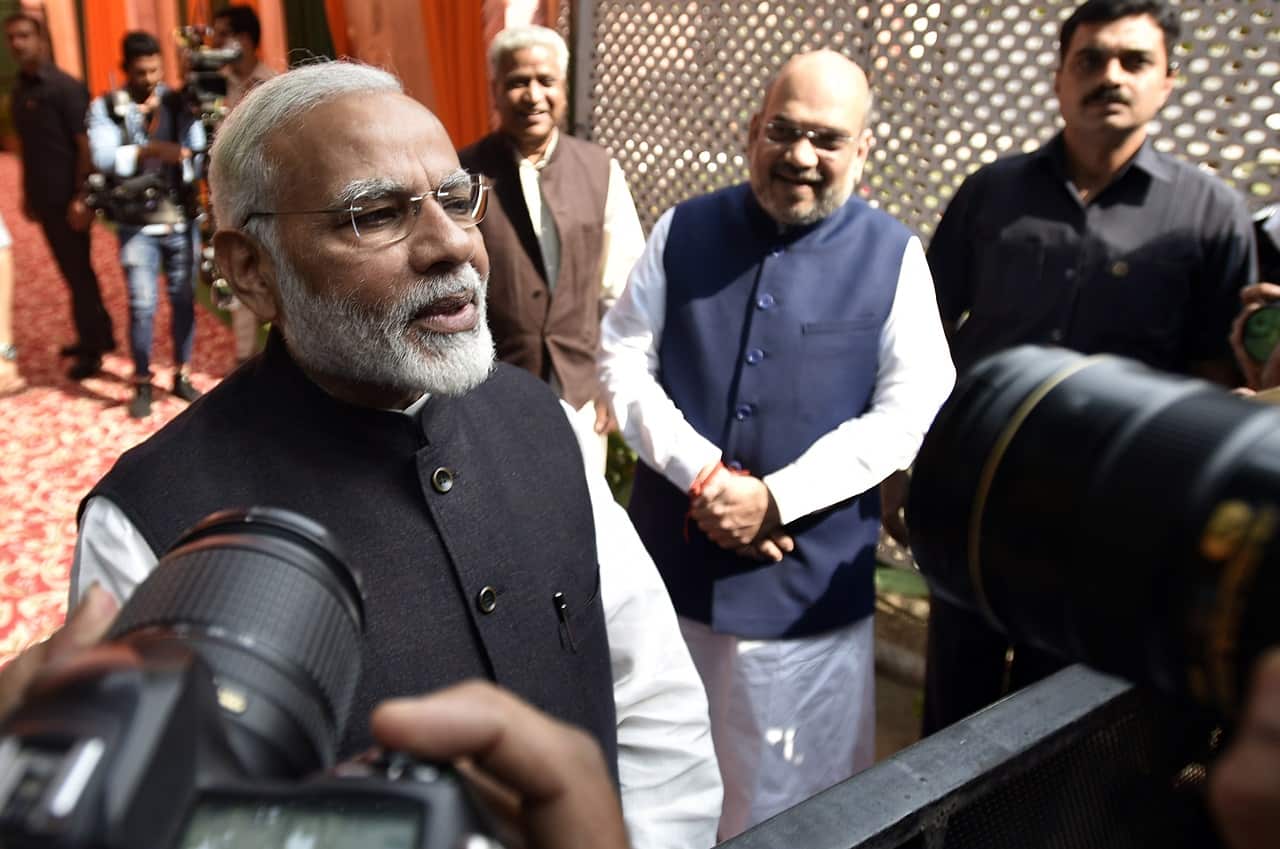 Prime Minister Narendra Modi talks to journalists.