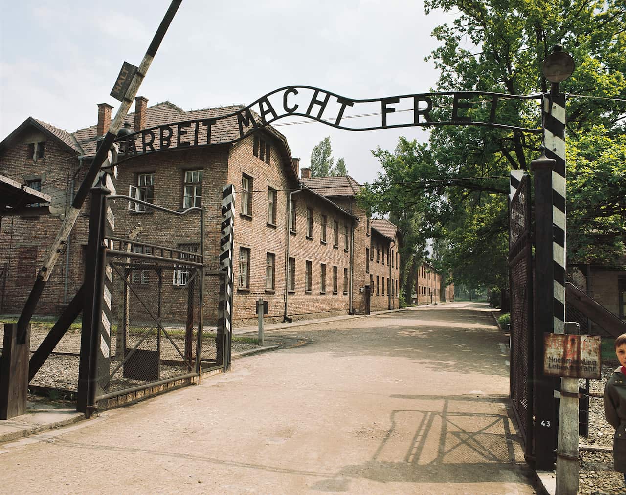 The entrance gate of one of the Auschwitz concentration camps, with the words 'Arbeit Macht Frei'.