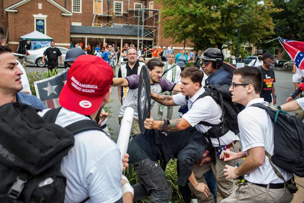 Violent clashes erupt at the 'Unite the Right' rally in Charlottesville on 12 August 2017.