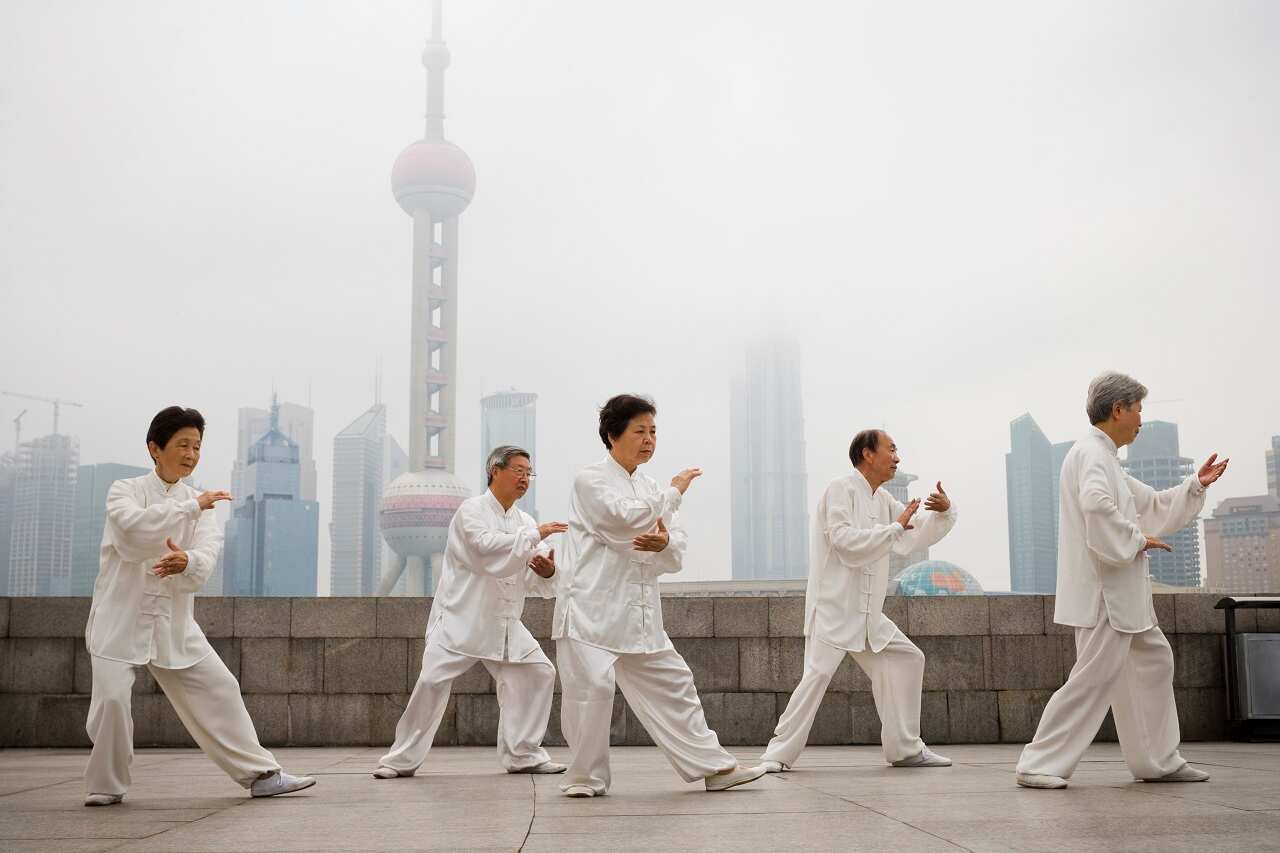 A group practicing Tai Chi in China.