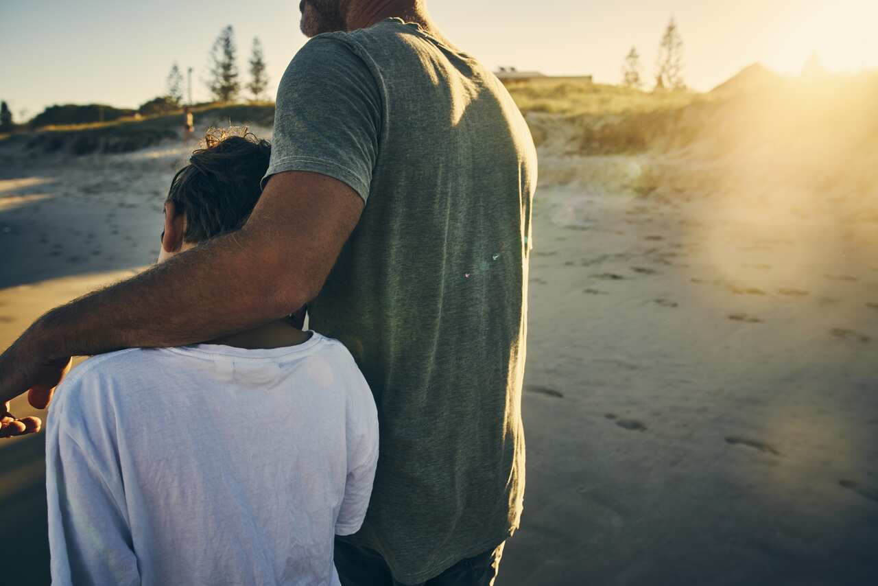 A father and son on the beach
