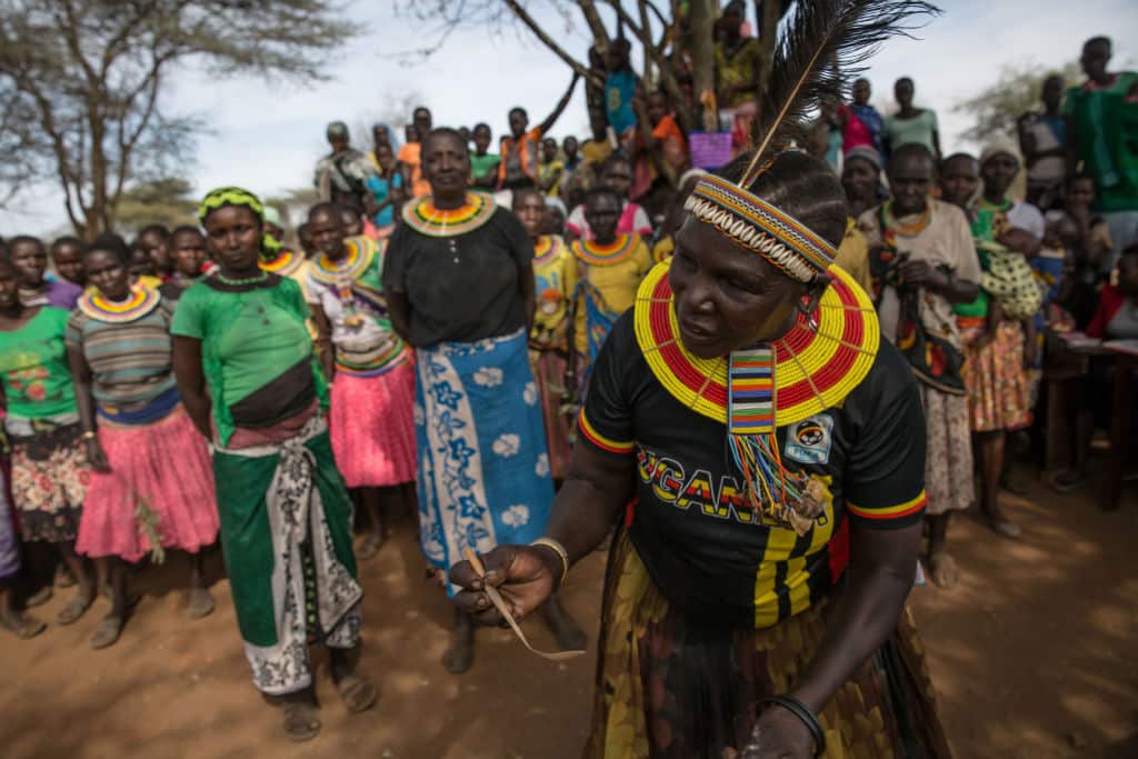 A former 'cutter' from the Pokot tribe displays the tool she used to use to carry out female genital mutilation (FGM) on young girls.