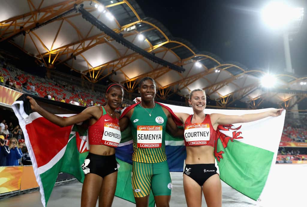 Silver medalist Beatrice Chepkoech of Kenya, gold medalist Caster Semenya of South Africa and bronze medalist Melissa Courtney of Wales celebrate after the Womens 1500 metres.