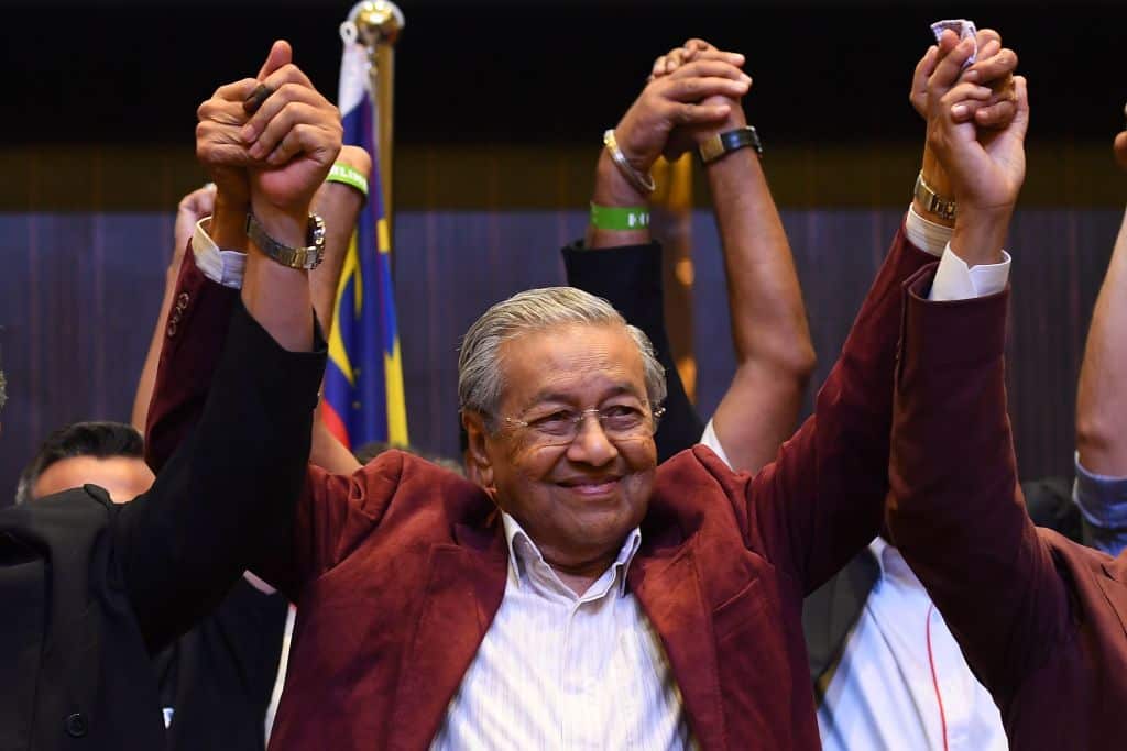 Prime Minister Mahathir Mohamad says he wants to cut debt by 65 percent.