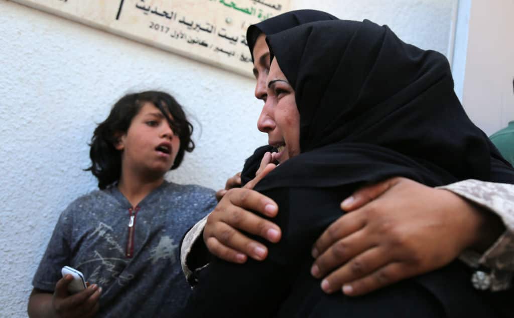 The mother of 8-month-old Palestinian infant Laila al-Ghandour cries after her daughter was killed.