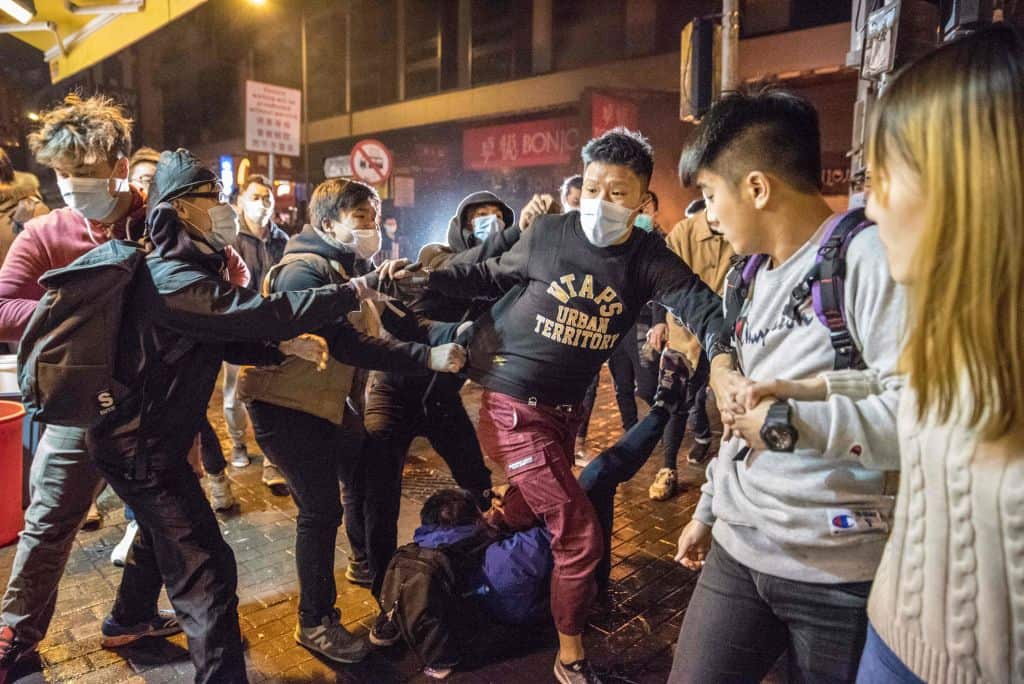 An altercation takes place during clashes between protesters and police in 2016.