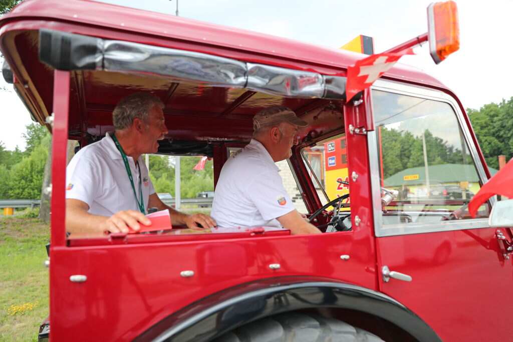 Swiss football fans travel to Kaliningrad for 2018 FIFA World Cup match between Switzerland and Serbia by tractor