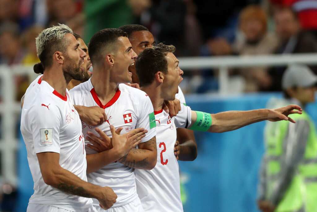 Granit Xhaka of Switzerland celebrates with an Albanian two-headed  eagle hand gesture after scoring his team's first goal during the 2018 FIFA World Cup