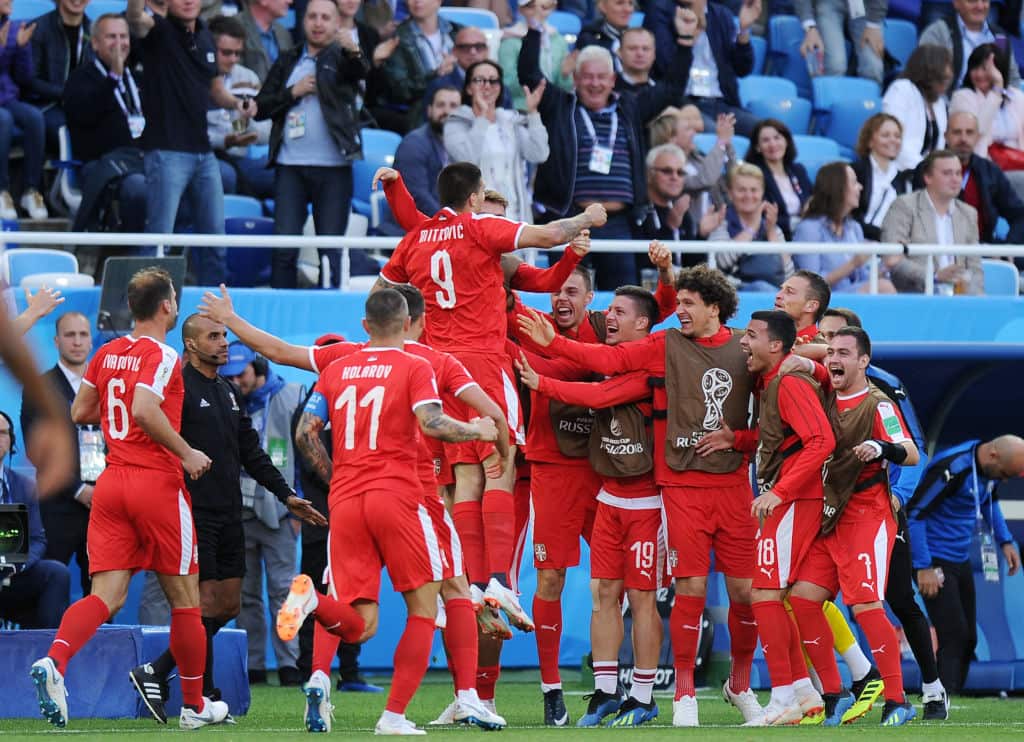 Aleksandar Mitrovic of Serbia celebrates scoring the goal with team mates during the 2018 FIFA World Cup Russia group E match between Serbia and Switzerland at Kaliningrad Stadium on June 22, 2018 in Kaliningrad, Russia.