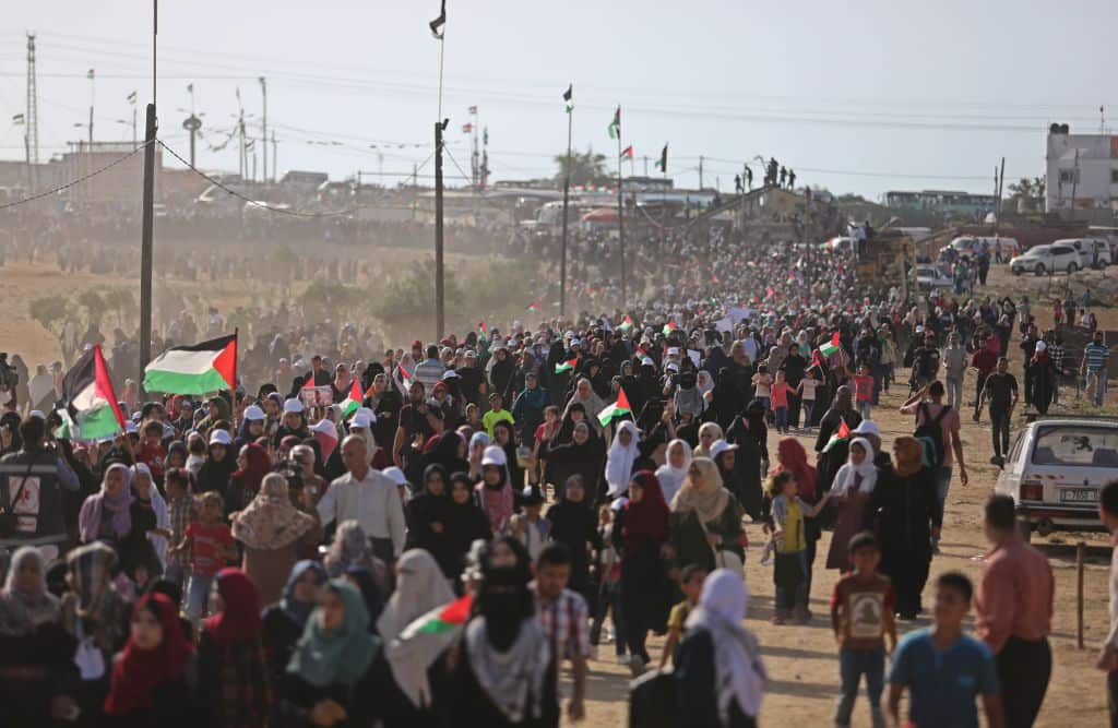 Palestinians stage a protest within the 'Great March of Return' demonstrations near Israel-Gaza border in Gaza City, Gaza on July 03, 2018.