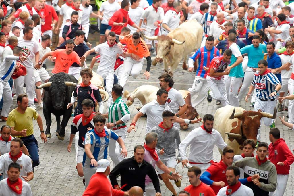One of the injured people was gored by a bull on the fist run of the festival. 
