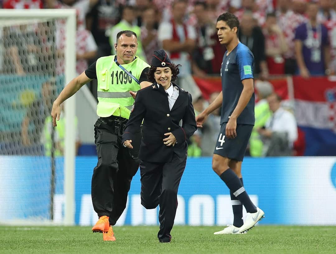 A Pussy Riot member on the pitch.