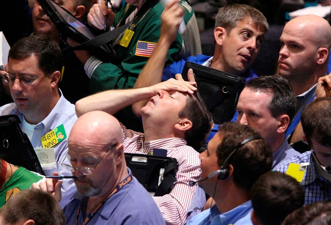 Traders at the New York Mercantile Exchange on 16 September 2008.  