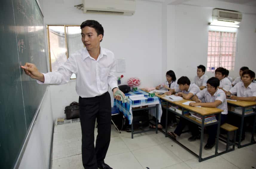 Tran Van Giap teaching Year 12 maths at Truong Thpt School in Ho Chi Minh city