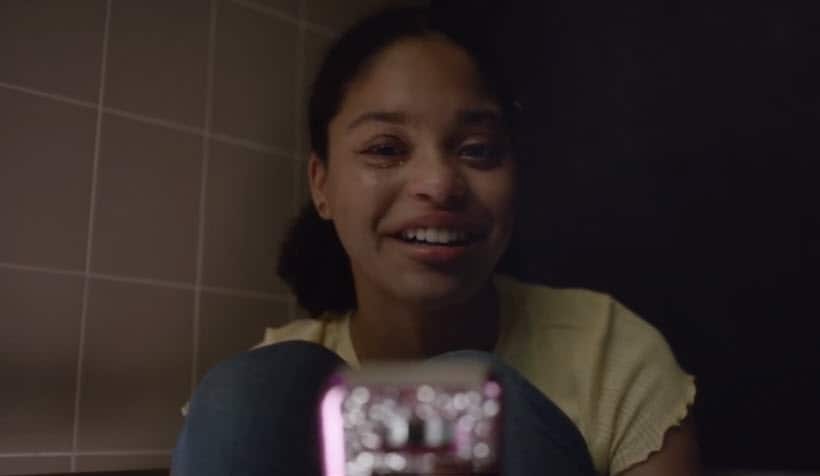 A student tells her mother she loves her on her brand new mobile phone.