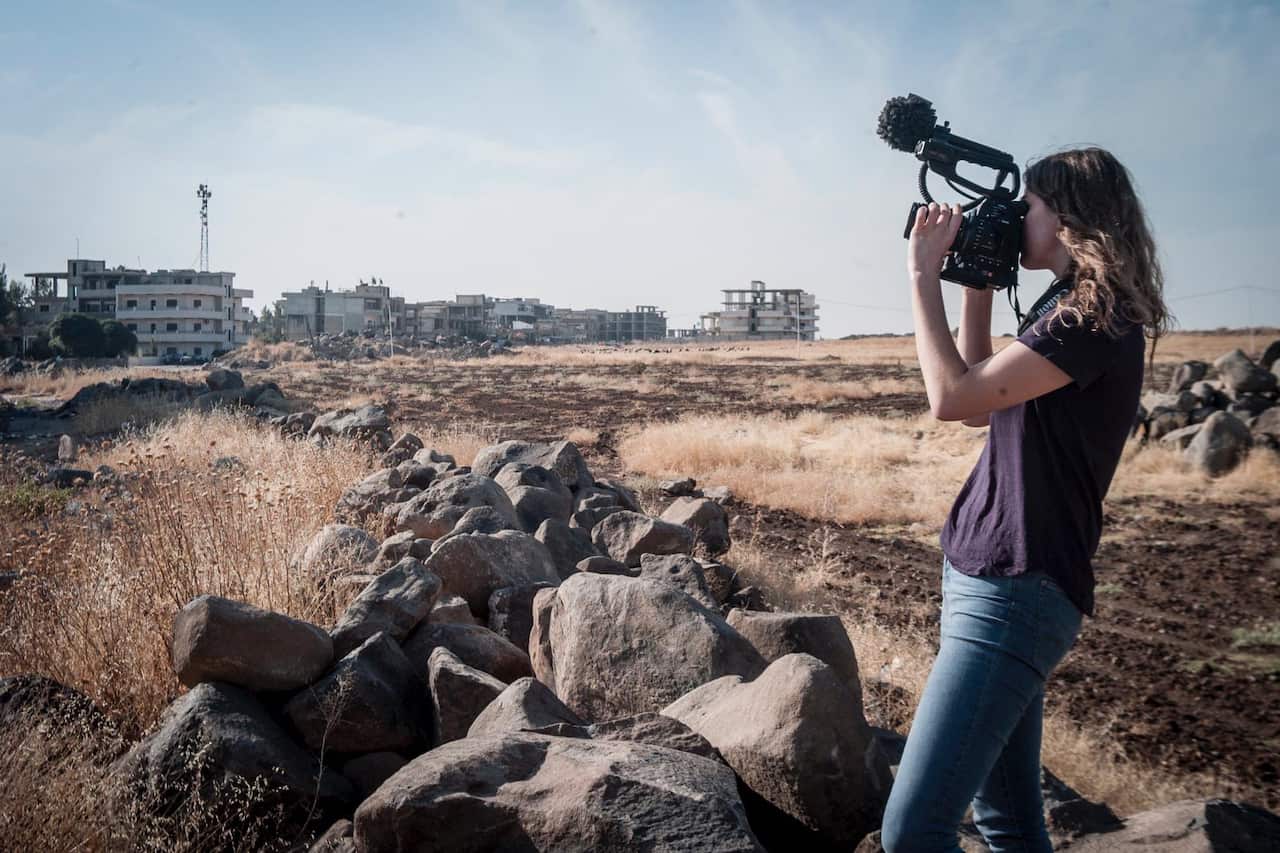 Giselle Hall is making a documentary in Syria. 