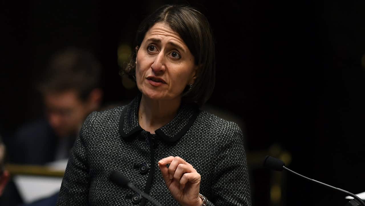 A photo of Gladys Berejiklian in a grey suit