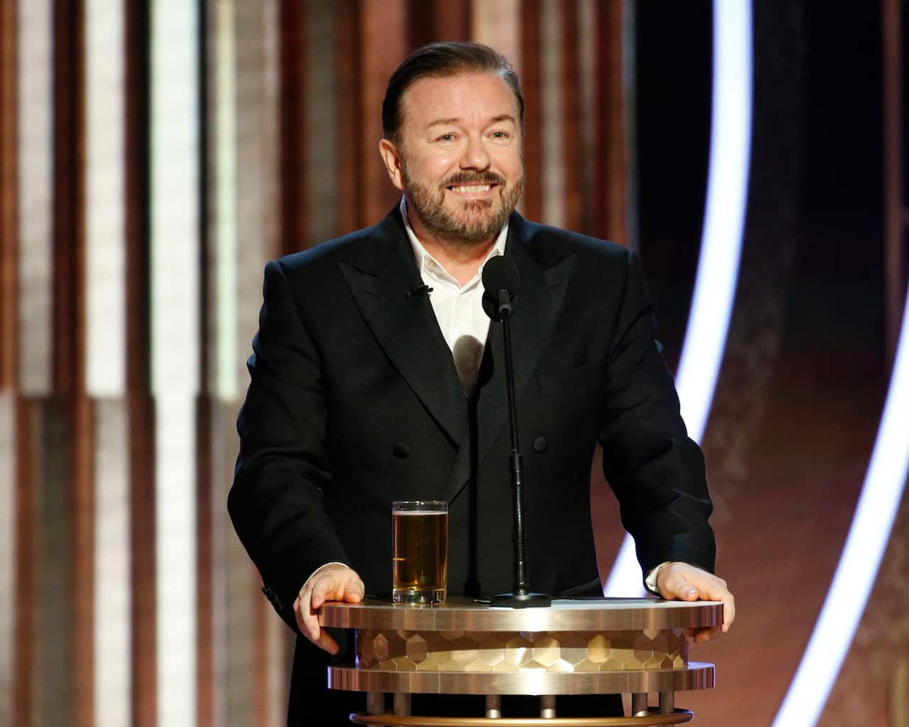 Gervais cracks a joke during hosting duties. 