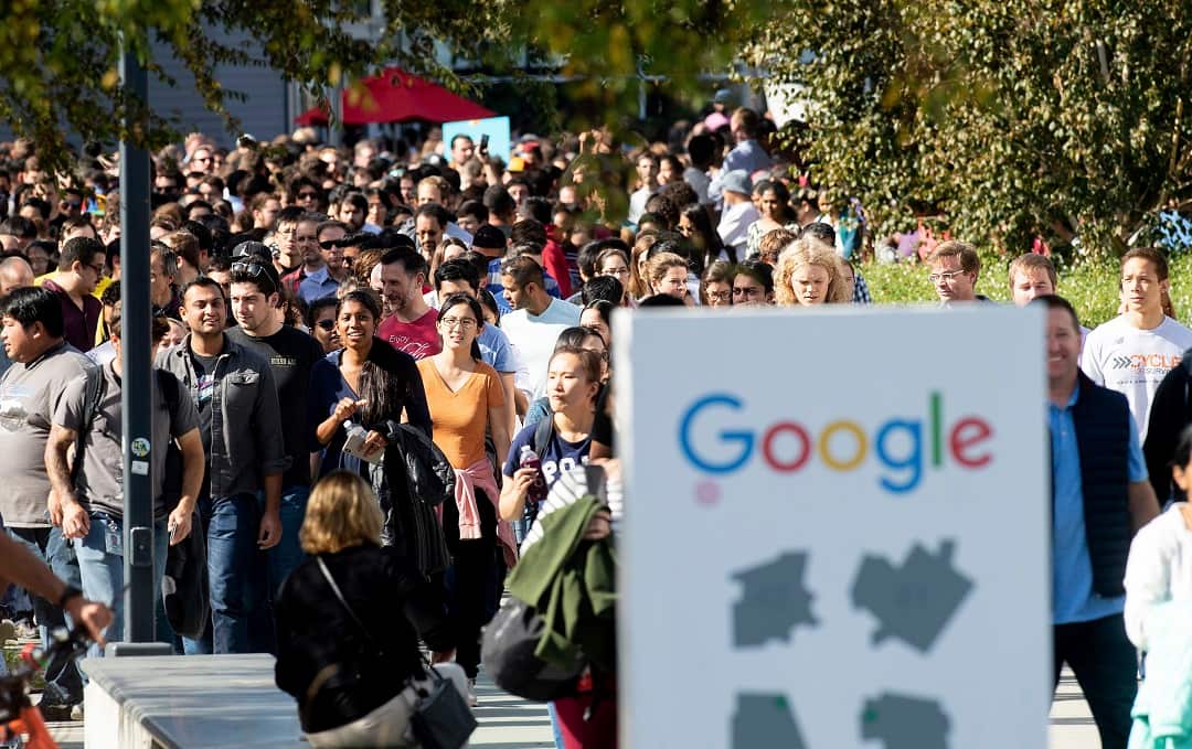 People leave Google's California office.
