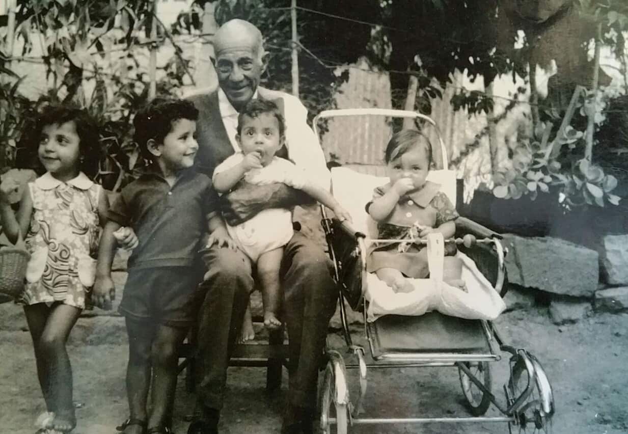 Grandfather Cemil Fedai holding baby Saab Hasan in Cyprus