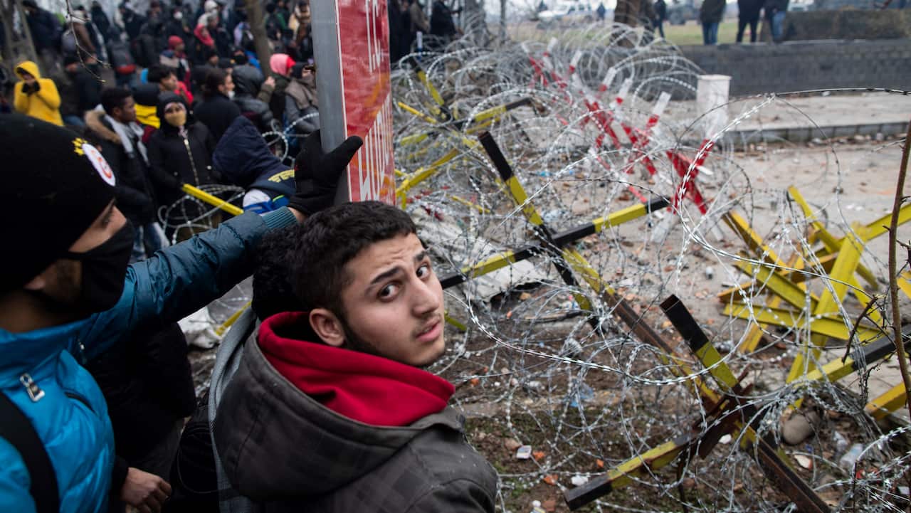 Refugees wait at the closed-off Turkish-Greek border in an attempt to enter Europe, Edirne, Turkey.