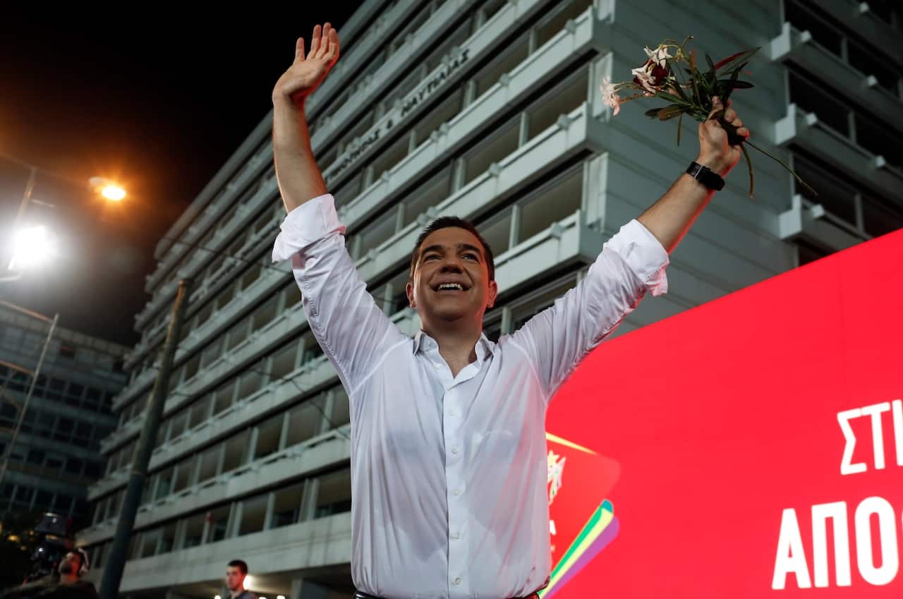Greek Prime Minister Alexis Tsipras waves to supporters during Syriza party's main pre-election rally at central Syntagma square in Athens, Greece, 05 July 2019. 