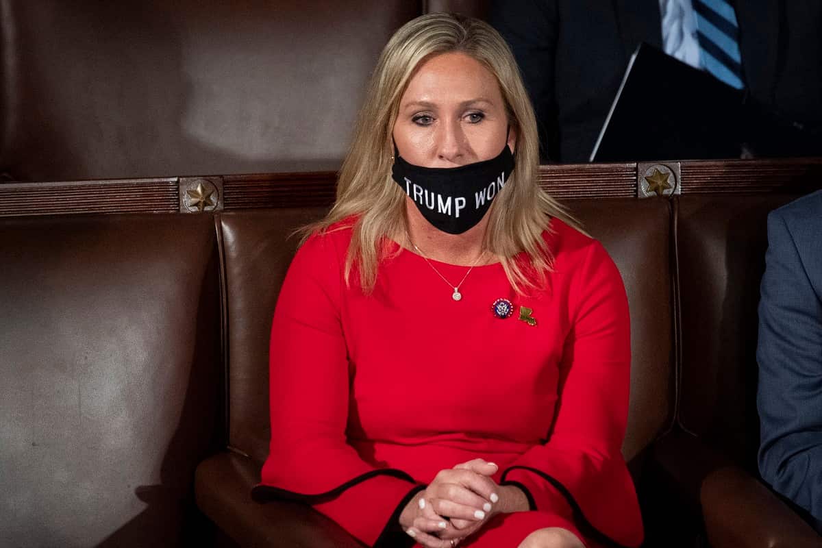 Marjorie Taylor Greene wearing a 'Trump Won' face mask during the first session of the 117th Congress in the House Chamber.