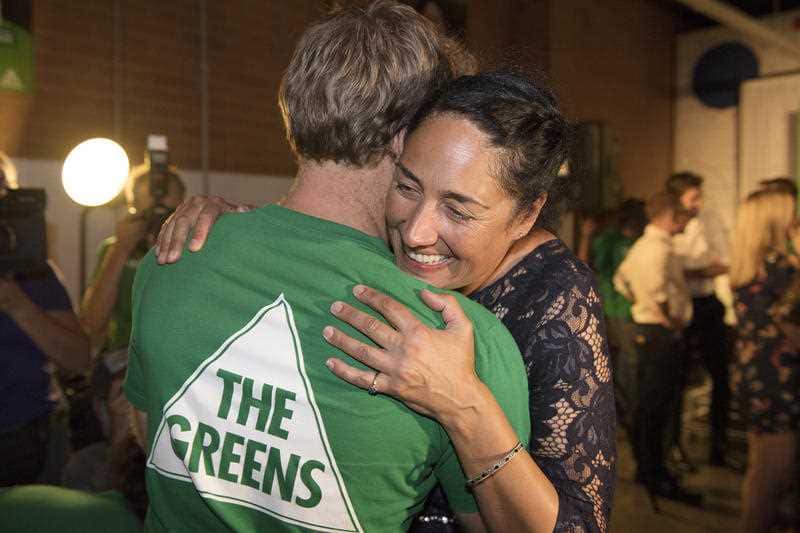 Former Greens candidate Alex Bhathal hugs a Greens volunteer. She won't be running on a Greens ticket this election. 