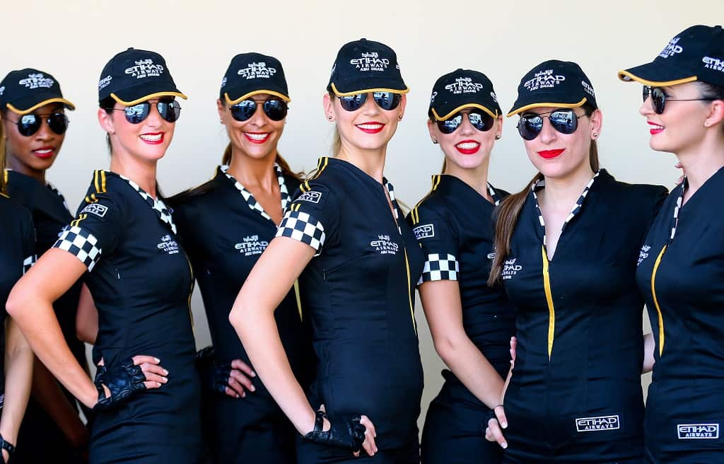 Grid Girls pose prior to the qualifying session at the Yas Marina Circuit in Abu Dhabi, United Arab Emirates, 02 November 2013.