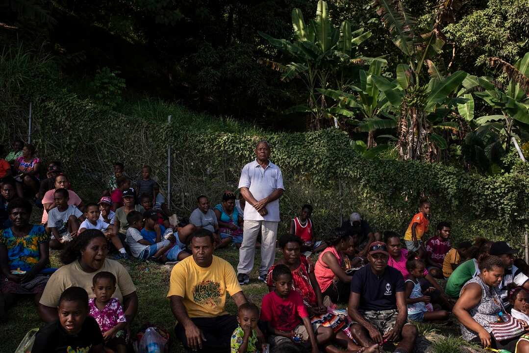 Islanders attend a birthday celebration for Queen Elizabeth II in Honiara on the island of Guadalcanal, Solomon Islands.