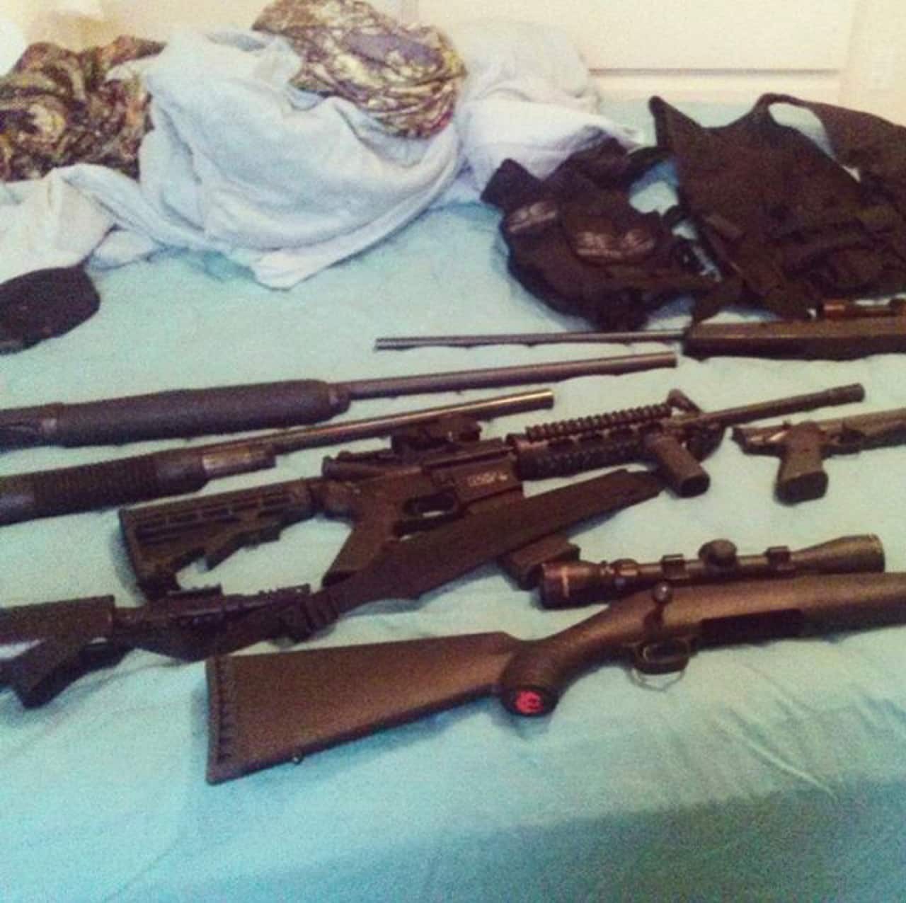 This photo posted on the Instagram account of Nikolas Cruz shows weapons lying on a bed. 