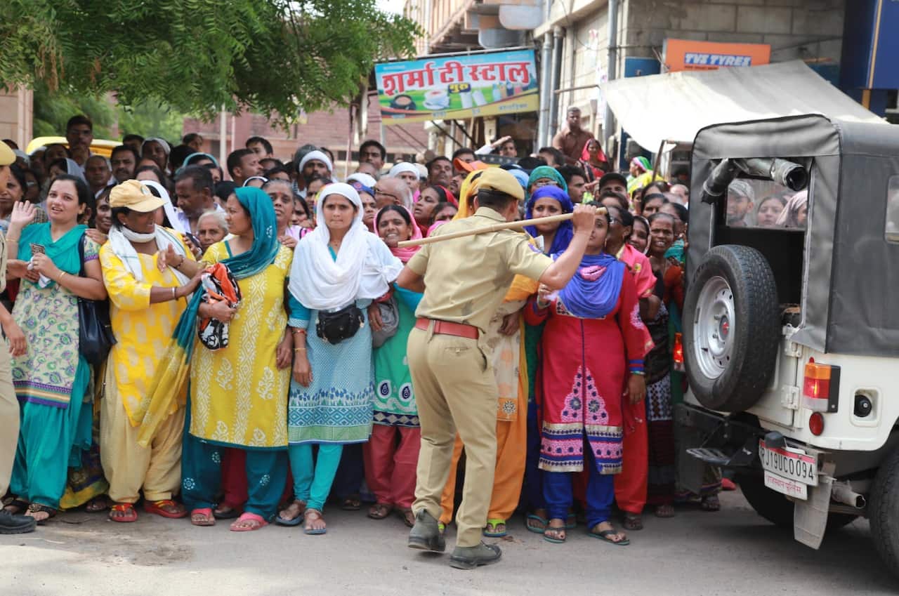 Supporters of Hindu religious leader Asaram Bapu, accused of sexually assaulting a minor gather outside court 