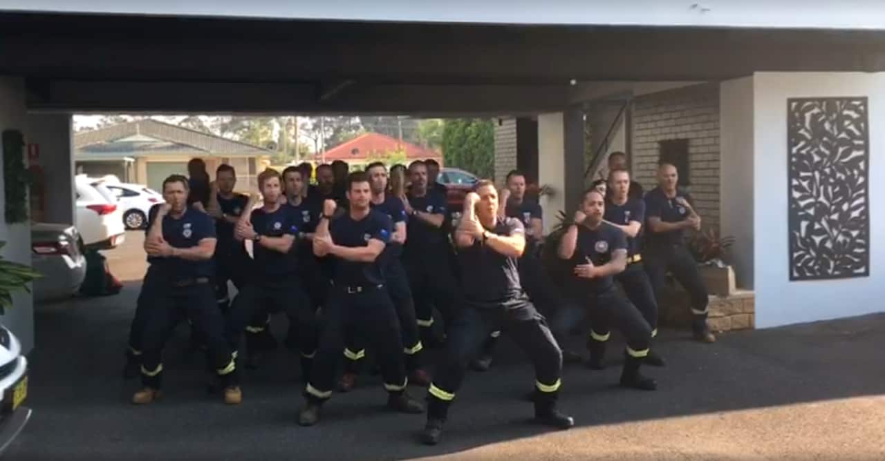 The New Zealand fire crew perform a traditional haka after spending three weeks fighting fires in NSW.