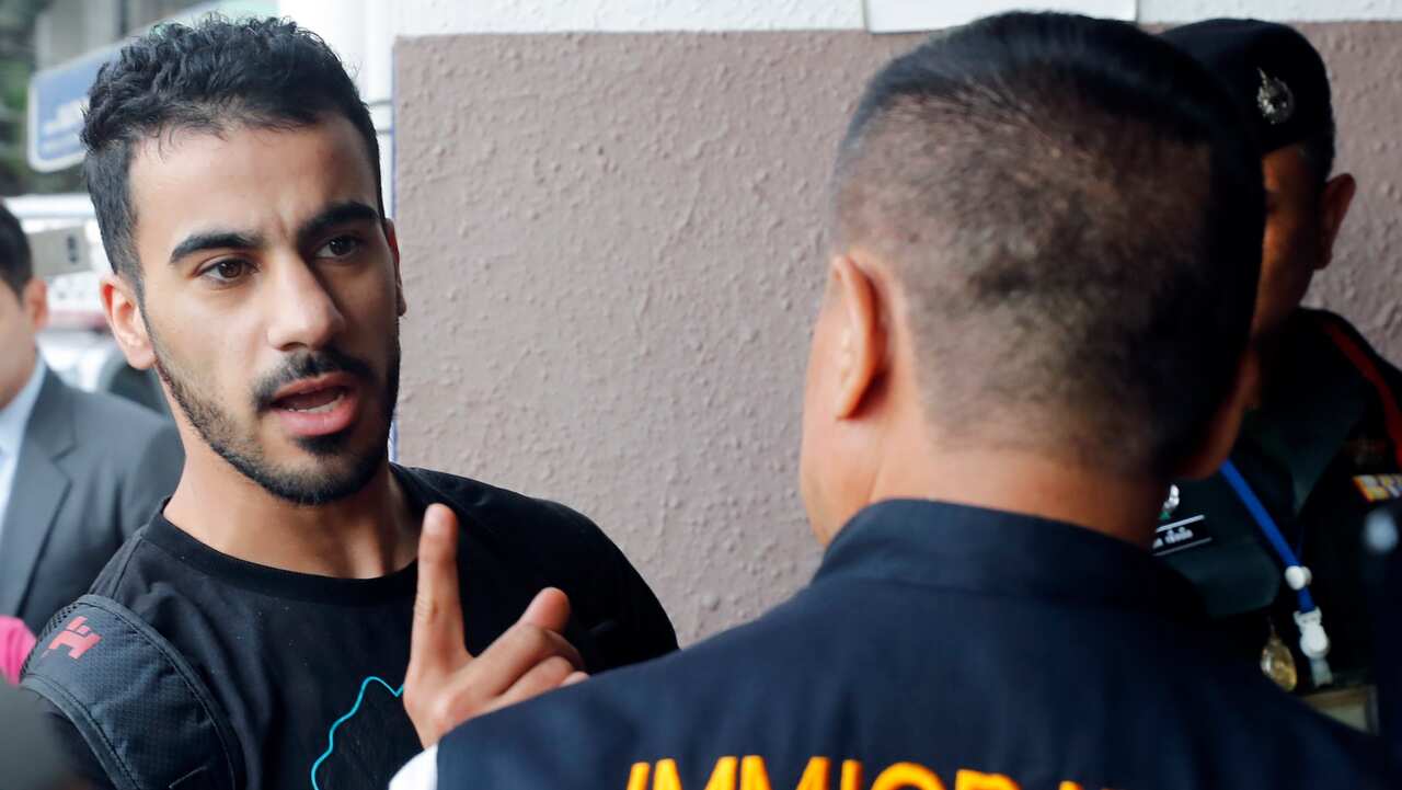 Hakeem Al-Araibi is escorted into the Criminal Court by authorities in Bangkok, Thailand, 11 December 2018.  