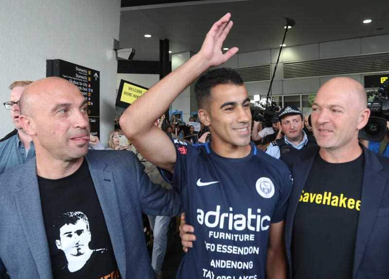 Supporters greet refugee footballer Hakeem Al-Araibi  at Melbourne airport.