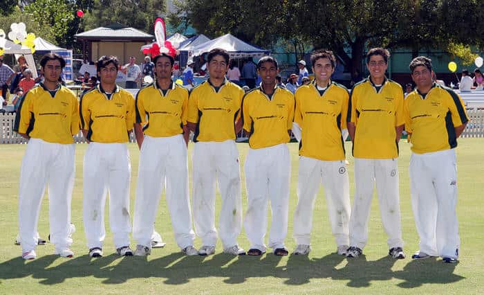 Runs in the Family: Hameed with brother Waheed (Hameed 2nd from right back row,  Waheed 3rd from right back row) at the Cricket Masala Festival (Supplied)