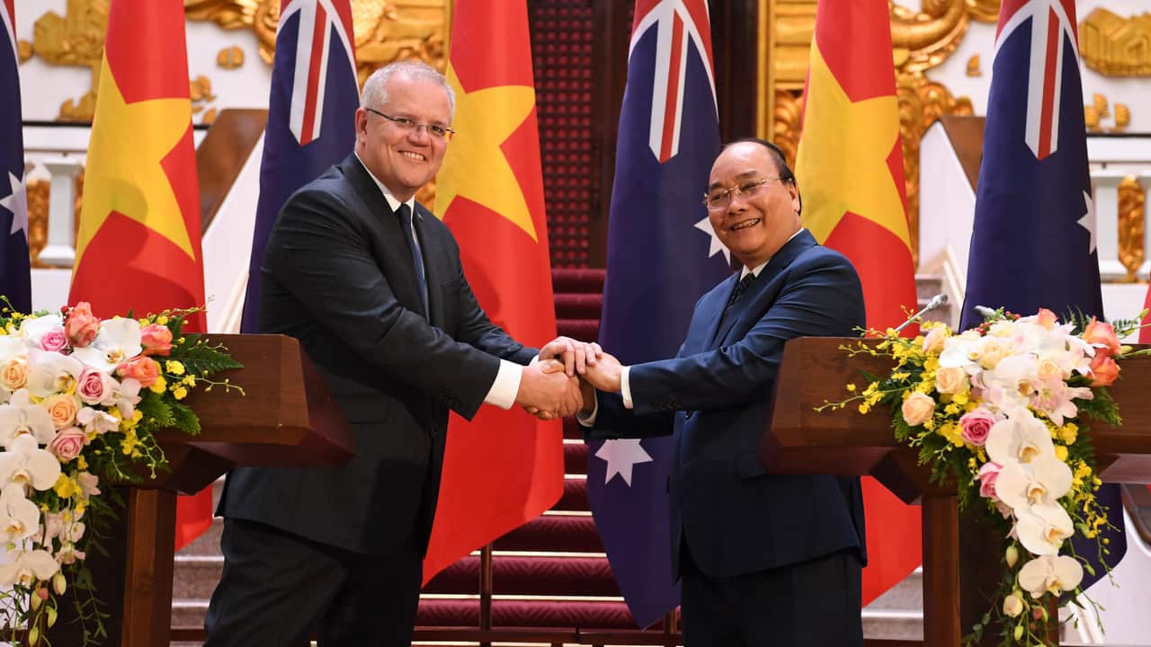 Australian Prime Minister Scott Morrison (left) his Vietnamese counterpart, Nguyen Xuan Phuc, shake hands during a press conference in Hanoi.
