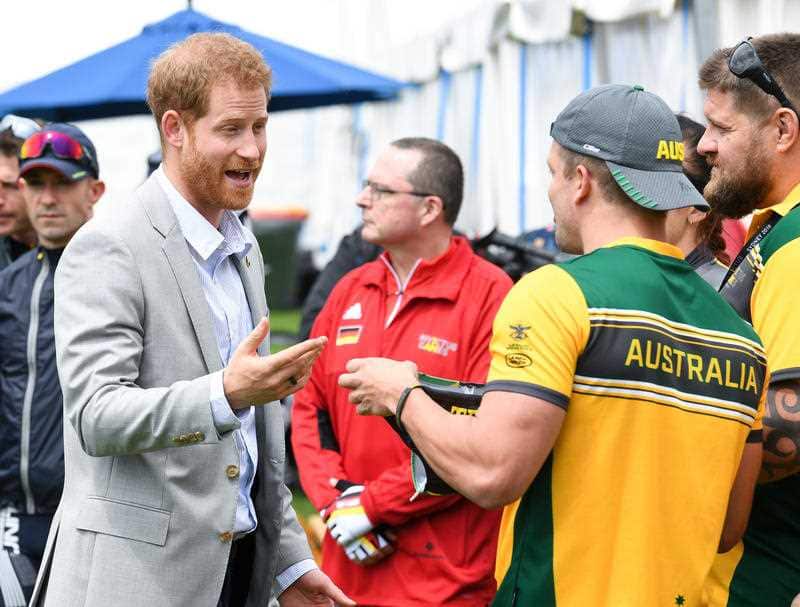 Duke of Sussex with Australian Invictus games cyclist who presented the Duke with some Aussie Budgie Smugglers.