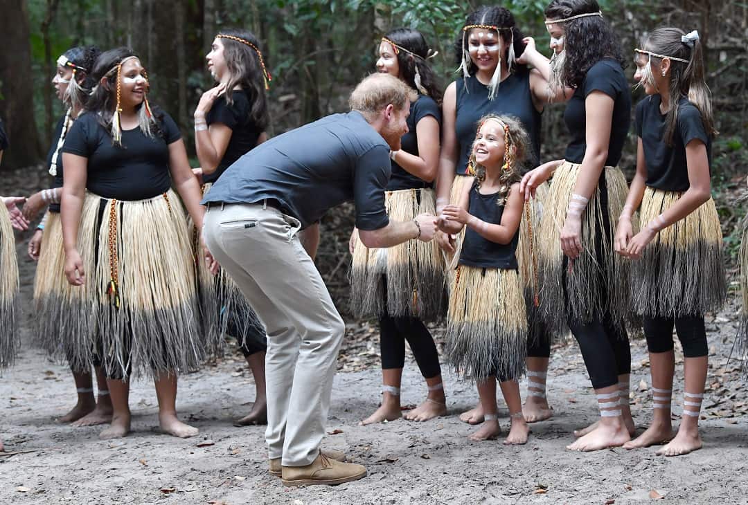 Prince Harry meets members of the Butchulla people, who are the traditional owners of Fraser Island.