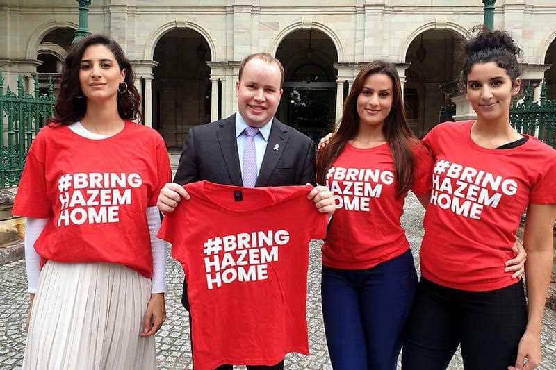 Daughters of Hamez Hamouda, Lamisse Hamouda, Queensland Labor MP Duncan Pegg, Amira Hamouda and Jasmine Hamouda campaigning for their dad's freedom last month. 