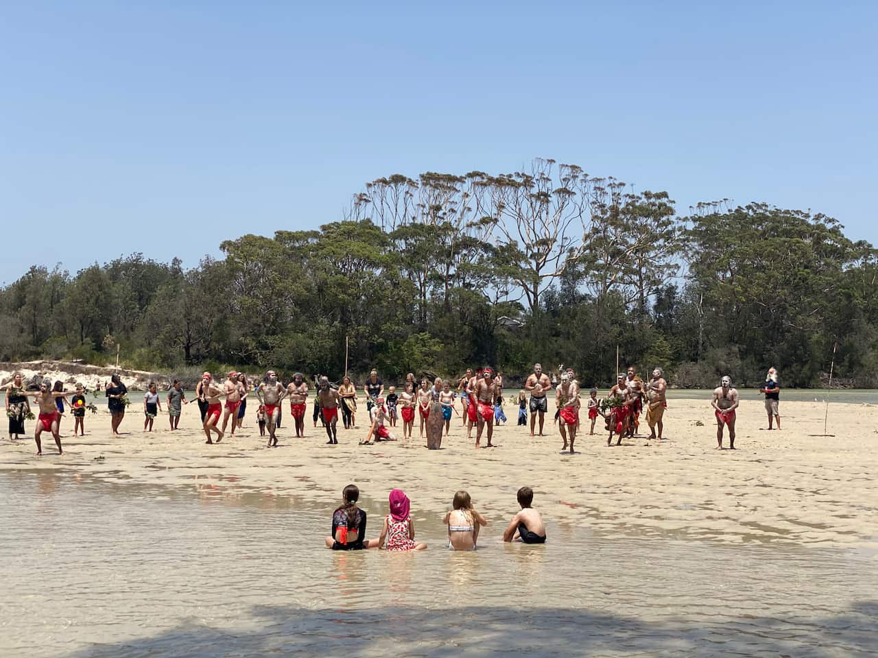 Performers at the corroboree dance and sing to pay tribute to those killed in the bushfires.