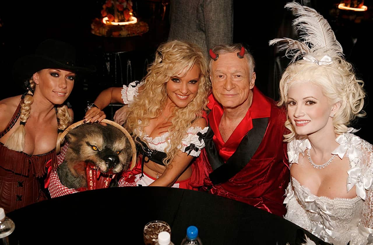 Halloween party In this photo released by Playboy, from left, Kendra Wilkinson, Bridget Marquardt, Hefner, and Holly Madison in 2007