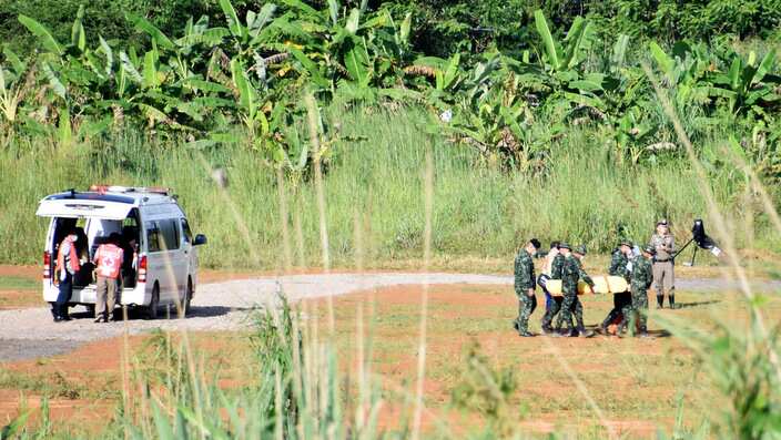 A stretcher carrying what is believed to be a fifth boy rescued from a cave in northern Thailand.