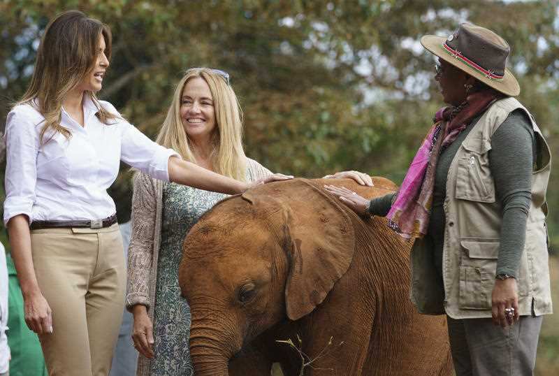 The First Lady fed an elephant and met with national park workers.